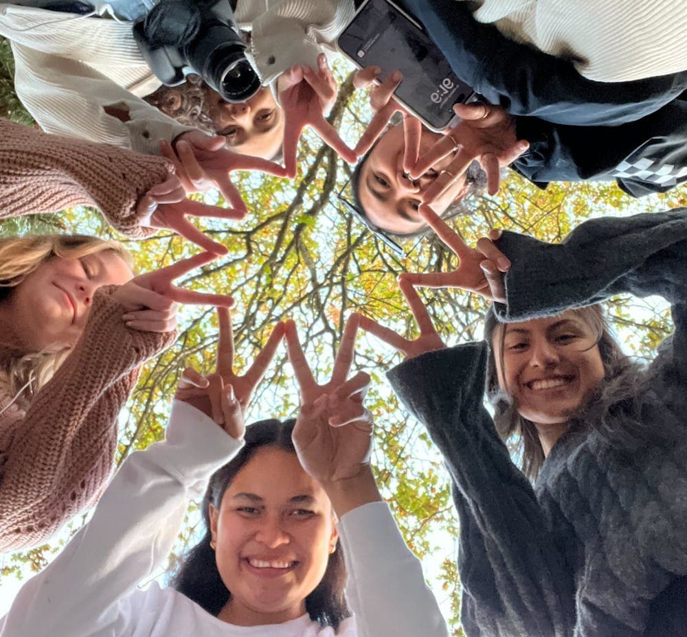 The VitalCore team together outdoors